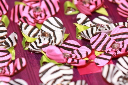 Pink and white zebra print hair accessories for favors