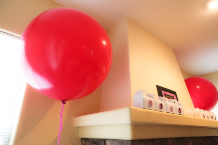 Big hot pink balloons and favor boxes